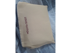 Pochette portafoglio Louis Vuitton uomo e donna