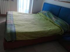 Struttura letto, como e comodini Marca Colombini