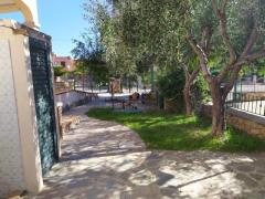 Alloggio con giardino posto auto a Budoni
