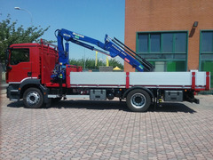 TRASPORTI CON CAMION 4 ASSI P.ta 140/160 ql. CON GRU A MILANO