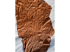 Pelle stropicciata raggrinzita anilina cognac