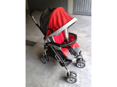 Passeggino Pliko P3 rosso-grigio in ottime condizioni, completo di tutti gli accessori (capotte, par