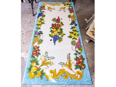 TAVOLI IN PIETRA LAVICA DECORATI A MANO A MILANO E IN LOMBARDIA