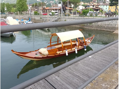 Barca d'epoca in legno a motore