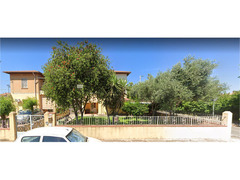 Appartamento con giardino e posti macchina