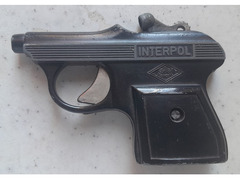 Pistola giocattolo in metallo con scritta "INTERPOL"  Italia anni 70 funzionante