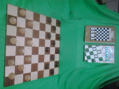 Set completo di Damiera e pedine in legno massiccio e pregiato con due libri sul gioco della dama.
