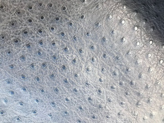 Pelle a vacchetta stampa struzzo nera
