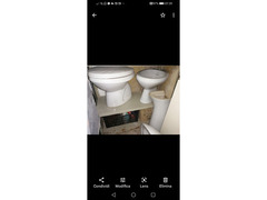 Lavandino, bidè e wc bianco smatato