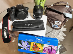 Vendo fotocamera reflex Canon 1000D Kit + Lenti