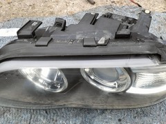Faro ant. sx. XENO BMW X5 E53 anno 2004