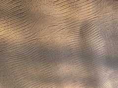 Pelle stampa lucertola colore camel