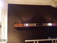 Testata letto vintage con radio e faretti