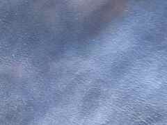 Pelle colore azzurro vetrificata per calzature