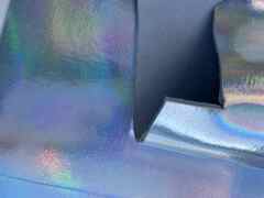 Pellame laminato effetto cromo fluorescente – DM3