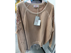 Abbigliamento in stock firmato Kontatto