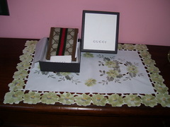 Portafoglio Gucci bi-fold in tessuto GG Supreme