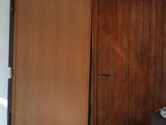 Portone per garage in ferro rivestito in legno