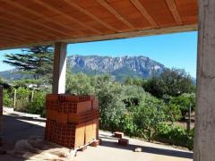 terreno con casa in costruzione