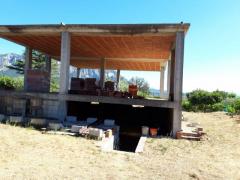 terreno con casa in costruzione