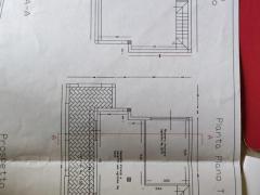 terreno con casa in costruzione
