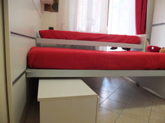 Cameretta con Boiserie a letti scorrevoli sovrapponibili
